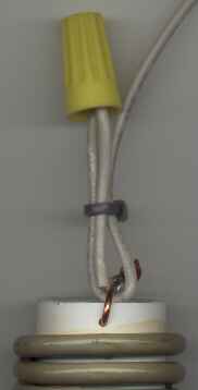 Pigtail connection to traps